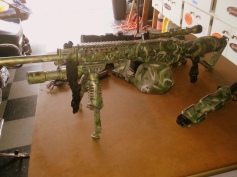 Airbrushed woodsy military type camo on AR15