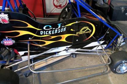 Flames and lettering on small race go-cart
