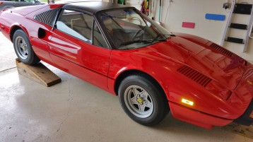 red ferrari wet sanded and buffed to a glass shine.